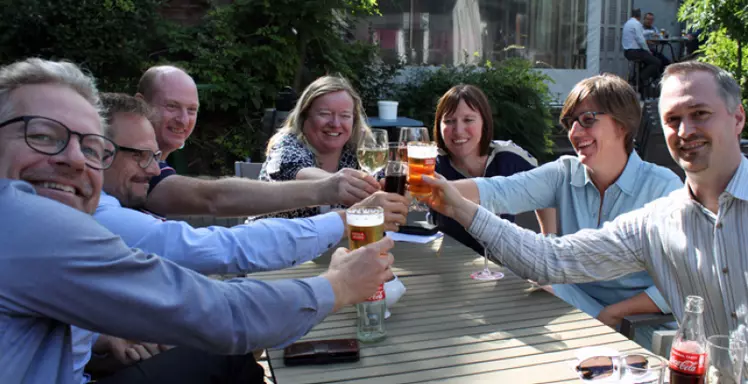 7 Savaco medewerkers die klinken op hun jubilarissen